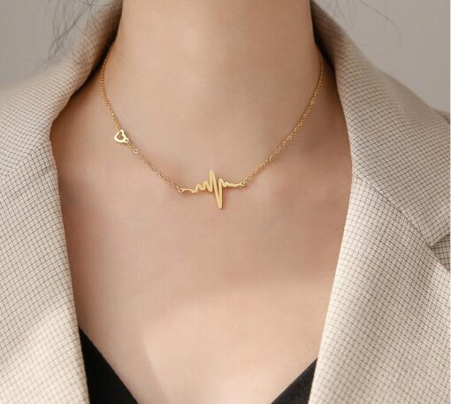 A women wearing Heartbeat necklace made by MinimalistBae